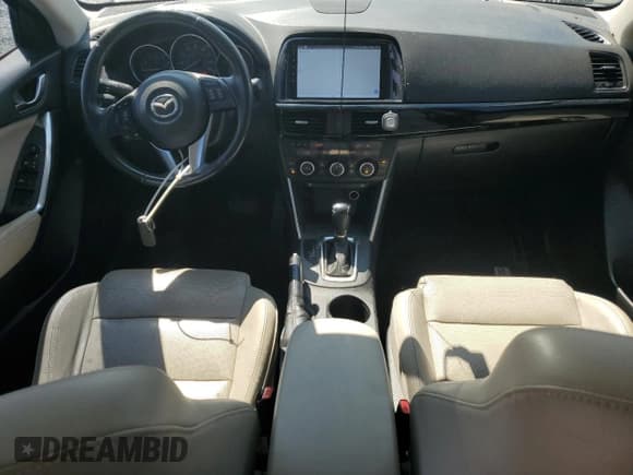 ✅ 2015 Mazda CX-5 Grand Touring • VIN: JM3KE2DY6F0448166 • Lot: 70999765. Wystawiony na Copart z przebiegiem 88 376 mil. Bezpłatny archiwum sprzedaży aukcyjnych z USA i szczegółowy raport historii pojazdu na DreamBid. Zdjęcie 8.