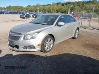 2013 Chevrolet Cruze LTZ z VIN 1G1PG5SB1D7120028, wystawiony jako IAAI lot #43409983 z przebiegiem 232 025 mil mil oraz . Historia ofert i sprzedaży dostępna na DreamBid. Obrazek 2.