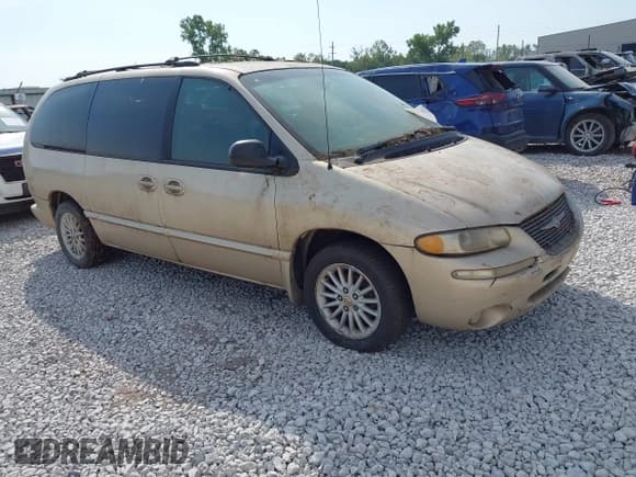 ✅ 2000 Chrysler Town & Country LX • VIN: 1C4GP44GXYB621903 • Lot: 43237805. Listed on IAAI with 167,717 mi. Free auction sales archive from the USA and detailed vehicle history report at DreamBid. Image 1.