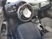 ✅ 2014 Volkswagen Beetle Entry • VIN: 3VWFP7AT6EM630517 • Lot: 83993975. Listed on Copart with 87,766 mi. Free auction sales archive from the USA and detailed vehicle history report at DreamBid. Image 8.