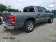 2006 Dodge Dakota SLT с VIN 1D7HE48KX6S526138, выставлен на аукционе Copart как лот 81651565 с пробегом 152 813 миль миль и Списание • Salvage title. История ставок и продаж доступна на DreamBid. Изображение 3.