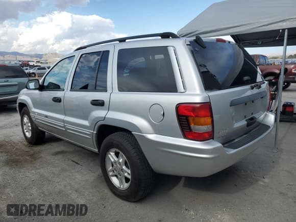 ✅ 2002 Jeep Grand Cherokee Laredo • VIN: 1J4GW48N32C254835 • Lot: 56066495. Listed on Copart with Not provided. Free auction sales archive from the USA and detailed vehicle history report at DreamBid. Image 2.