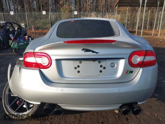 ✅ 2014 Jaguar XK XKR • VIN: SAJWA4DC7EMB52199 • Lot: 41191119. Listed on IAAI with 90,585 mi. Free auction sales archive from the USA and detailed vehicle history report at DreamBid. Image 16.