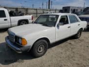 ✅ 1985 Mercedes-Benz 300 • VIN: WDBAB33C5FA264693 • Lot: 47318655. Listed on Copart with 241,531 mi. Free auction sales archive from the USA and detailed vehicle history report at DreamBid. Image 1.