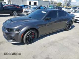 2023 Dodge Charger SRT Hellcat Redeye Widebody z VIN 2C3CDXL94PH503237, wystawiony jako Copart lot #83869155 z przebiegiem 27 372 mil mil oraz Szkoda całkowita • Salvage title. Historia ofert i sprzedaży dostępna na DreamBid. Obrazek 1.