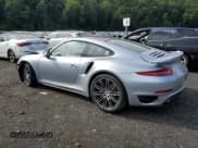 ✅ 2015 Porsche 911 Turbo S • VIN: WP0AD2A97FS166370 • Lot: 68497274. Listed on Copart with 3,015 mi. Free auction sales archive from the USA and detailed vehicle history report at DreamBid. Image 2.