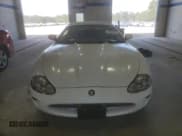 ✅ 1998 Jaguar XK • VIN: SAJGX224XWC019640 • Лот: 83964425. Опубликован ранее на Copart с пробегом 61 965 миль. Бесплатный доступ к архиву аукционных продаж из США и подробный отчёт об истории автомобиля на DreamBid. Изображение 5.