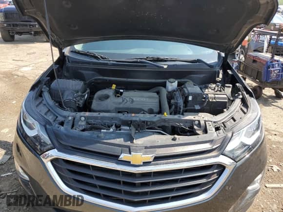 2020 Chevrolet Equinox LT с VIN 3GNAXJEV0LS518902, выставлен на аукционе Copart как лот 68867145 с пробегом 57 930 миль миль и Списание • Salvage title. История ставок и продаж доступна на DreamBid. Изображение 11.