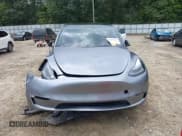 ✅ 2025 Tesla Model Y Long Range • VIN: 7SAYGDED0SA345552 • Лот: 43063341. Опубликован ранее на IAAI с пробегом 21 396 миль. Бесплатный доступ к архиву аукционных продаж из США и подробный отчёт об истории автомобиля на DreamBid. Изображение 12.