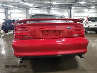 ✅ 1995 Ford Mustang • VIN: 1FALP45T9SF256016 • Lot: 71848995. Listed on Copart with 37,311 mi. Free auction sales archive from the USA and detailed vehicle history report at DreamBid. Image 6.
