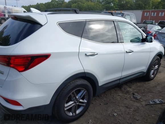 ✅ 2017 Hyundai Santa Fe 2.4L • VIN: 5NMZUDLB1HH002299 • Lot: 43256960. Listed on IAAI with 95,485 mi. Free auction sales archive from the USA and detailed vehicle history report at DreamBid. Image 14.