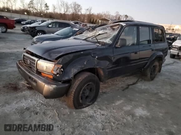 ✅ 1997 Toyota Land Cruiser • VIN: JT3HJ85J1V0161744 • Lot: 86346574. Listed on Copart with 104,904 mi. Free auction sales archive from the USA and detailed vehicle history report at DreamBid. Image 1.