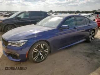✅ 2016 BMW 7 Series 750i • VIN: WBA7F0C53GGL99778 • Lot: 92937955. Listed on Copart with 105,323 mi. Free auction sales archive from the USA and detailed vehicle history report at DreamBid. Image 1.