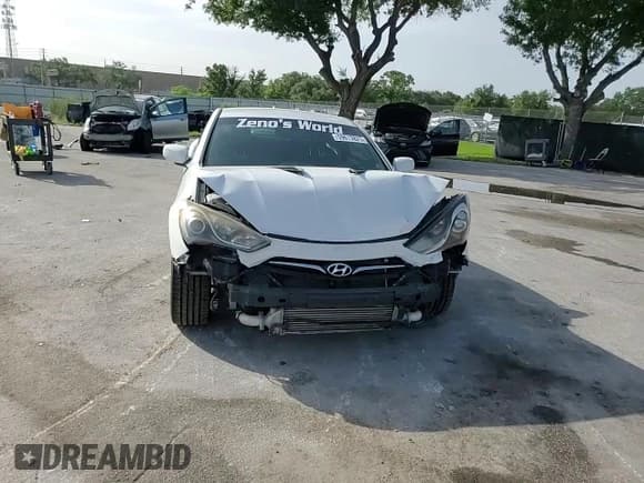 ✅ 2013 Hyundai Genesis Coupe 2.0T • VIN: KMHHT6KD1DU097572 • Lot: 59613825. Wystawiony na Copart z przebiegiem 158 758 mil. Bezpłatny archiwum sprzedaży aukcyjnych z USA i szczegółowy raport historii pojazdu na DreamBid. Zdjęcie 13.