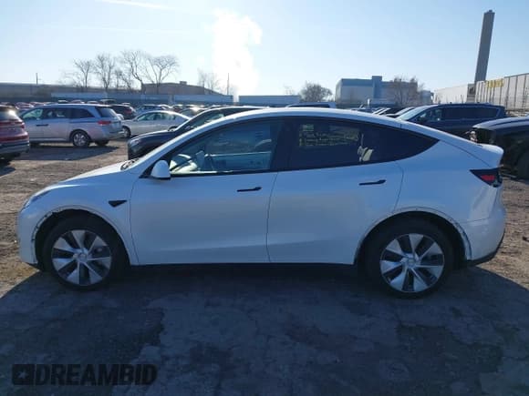 ✅ 2023 Tesla Model Y Long Range • VIN: 7SAYGDEE5PF765326 • Lot: 41757113. Listed on IAAI with 10,461 mi. Free auction sales archive from the USA and detailed vehicle history report at DreamBid. Image 15.