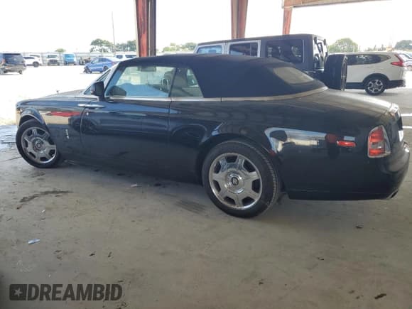 ✅ 2010 Rolls-Royce Drophead Coupe • VIN: SCA682D5XAUX16443 • Lot: 54937945. Wystawiony na Copart z przebiegiem 95 859 mil. Bezpłatny archiwum sprzedaży aukcyjnych z USA i szczegółowy raport historii pojazdu na DreamBid. Zdjęcie 2.