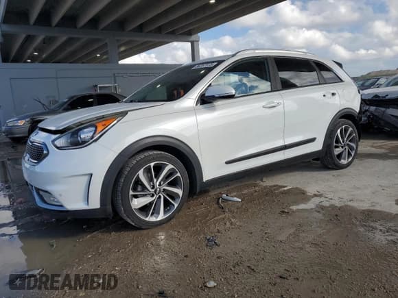 ✅ 2017 Kia Niro Touring • VIN: KNDCE3LC2H5082382 • Lot: 86267075. Wystawiony na Copart z przebiegiem 67 385 mil. Bezpłatny archiwum sprzedaży aukcyjnych z USA i szczegółowy raport historii pojazdu na DreamBid. Zdjęcie 1.