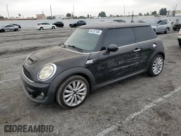 2012 MINI Hardtop S with VIN WMWSV3C52CTY17540, listed as a Copart auction lot 64137185 with 115,542 mi miles and Salvage title. Bid and sale history available at DreamBid. Image 1.