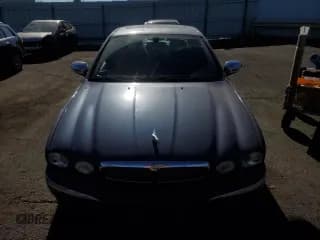 ✅ 2004 Jaguar X-Type • VIN: SAJEA51C04WD74995 • Лот: 77216404. Опубликован ранее на Copart с пробегом 87 853 миль. Бесплатный доступ к архиву аукционных продаж из США и подробный отчёт об истории автомобиля на DreamBid. Изображение 5.