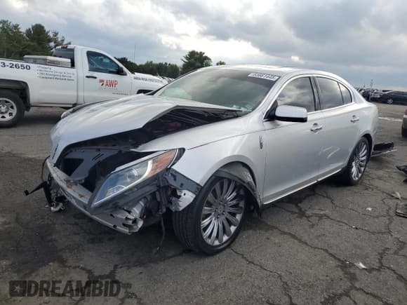 ✅ 2014 Lincoln MKS • VIN: 1LNHL9EK9EG606528 • Lot: 83861445. Listed on Copart with 100,250 mi. Free auction sales archive from the USA and detailed vehicle history report at DreamBid. Image 1.