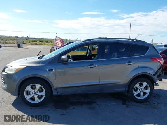 ✅ 2013 Ford Escape SE • VIN: 1FMCU0G94DUD09793 • Lot: 43432396. Listed on IAAI with 121,787 mi. Free auction sales archive from the USA and detailed vehicle history report at DreamBid. Image 14.