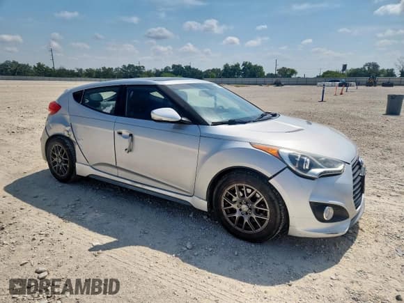 ✅ 2013 Hyundai Veloster Turbo • VIN: KMHTC6AE2DU125545 • Lot: 81344865. Listed on Copart with 105,803 mi. Free auction sales archive from the USA and detailed vehicle history report at DreamBid. Image 4.
