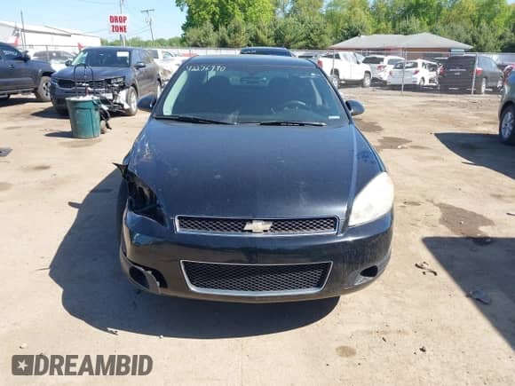 2013 Chevrolet Impala Police with VIN 2G1WD5E31D1256682, listed as a IAAI auction lot 42276990 with 148,251 mi miles and . Bid and sale history available at DreamBid. Image 13.