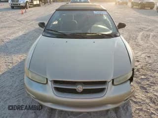 ✅ 1998 Chrysler Sebring JX • VIN: 3C3EL45H3WT276868 • Lot: 75484314. Listed on Copart with 75,317 mi. Free auction sales archive from the USA and detailed vehicle history report at DreamBid. Image 5.