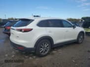 ✅ 2018 Mazda CX-9 Touring • VIN: JM3TCBCY8J0230282 • Лот: 85410415. Опубликован ранее на Copart с пробегом 133 809 миль. Бесплатный доступ к архиву аукционных продаж из США и подробный отчёт об истории автомобиля на DreamBid. Изображение 3.