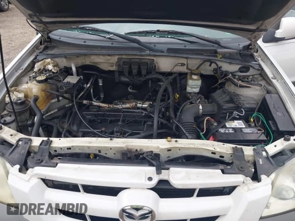 ✅ 2005 Mazda Tribute i • VIN: 4F2YZ92Z75KM42150 • Lot: 42703391. Listed on IAAI with 187,595 mi. Free auction sales archive from the USA and detailed vehicle history report at DreamBid. Image 10.