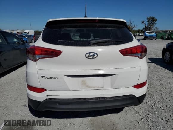 ✅ 2017 Hyundai Tucson SE • VIN: KM8J23A47HU260235 • Lot: 90850905. Listed on Copart with 100,812 mi. Free auction sales archive from the USA and detailed vehicle history report at DreamBid. Image 6.