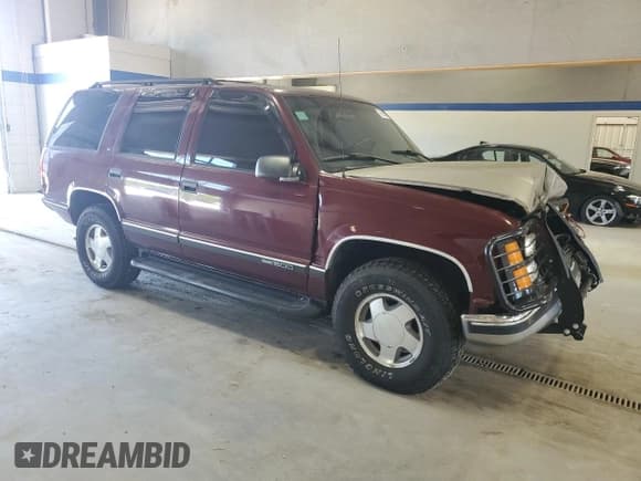 ✅ 1999 GMC Yukon • VIN: 1GKEK13R6XJ803226 • Lot: 58859245. Listed on Copart with 256,019 mi. Free auction sales archive from the USA and detailed vehicle history report at DreamBid. Image 4.