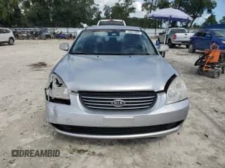 ✅ 2006 Kia Optima LX • VIN: KNAGE123X65063709 • Лот: 75927094. Опубликован ранее на Copart с пробегом 101 893 миль. Бесплатный доступ к архиву аукционных продаж из США и подробный отчёт об истории автомобиля на DreamBid. Изображение 5.