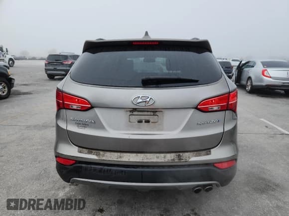 ✅ 2014 Hyundai Santa Fe • VIN: 5XYZU3LA9EG227528 • Lot: 92862125. Wystawiony na Copart z przebiegiem 90 969 mil. Bezpłatny archiwum sprzedaży aukcyjnych z USA i szczegółowy raport historii pojazdu na DreamBid. Zdjęcie 6.
