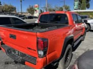 ✅ 2023 Toyota Tacoma SR • VIN: 3TYCZ5AN8PT152677 • Lot: 43587332. Listed on IAAI with 14,964 mi. Free auction sales archive from the USA and detailed vehicle history report at DreamBid. Image 4.