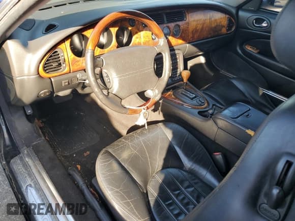 ✅ 2001 Jaguar XK • VIN: SAJDA41C81NA22352 • Lot: 74274694. Wystawiony na Copart z przebiegiem 151 303 mil. Bezpłatny archiwum sprzedaży aukcyjnych z USA i szczegółowy raport historii pojazdu na DreamBid. Zdjęcie 8.