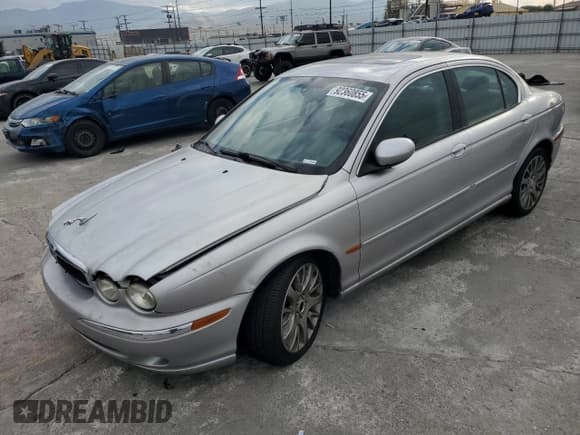 ✅ 2003 Jaguar X-Type 2.5L Manual • VIN: SAJEA51D33XD30037 • Lot: 92360855. Wystawiony na Copart z przebiegiem 107 252 mil. Bezpłatny archiwum sprzedaży aukcyjnych z USA i szczegółowy raport historii pojazdu na DreamBid. Zdjęcie 1.