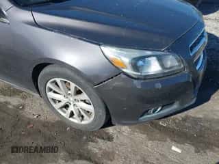 2013 Chevrolet Malibu LT z VIN 1G11E5SA1DF311635, wystawiony jako IAAI lot #43429952 z przebiegiem 188 889 mil mil oraz . Historia ofert i sprzedaży dostępna na DreamBid. Obrazek 6.