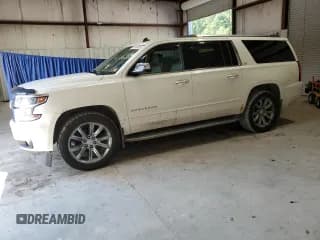 ✅ 2015 Chevrolet Suburban LTZ • VIN: 1GNSKKKC0FR286210 • Lot: 66916085. Listed on Copart with 175,469 mi. Free auction sales archive from the USA and detailed vehicle history report at DreamBid. Image 1.