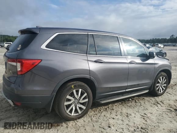 ✅ 2019 Honda Pilot EX-L • VIN: 5FNYF5H45KB007410 • Lot: 68259885. Listed on Copart with 129,882 mi. Free auction sales archive from the USA and detailed vehicle history report at DreamBid. Image 3.