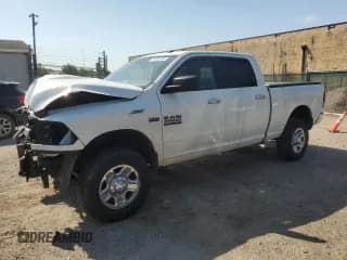 ✅ 2016 Ram 2500 SLT • VIN: 3C6TR5DT6GG379085 • Lot: 61930295. Listed on Copart with 133,817 mi. Free auction sales archive from the USA and detailed vehicle history report at DreamBid. Image 1.
