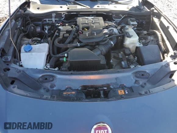 ✅ 2017 FIAT 124 Spider Lusso • VIN: JC1NFAEK5H0106005 • Лот: 86717805. Опубликован ранее на Copart с пробегом 86 968 миль. Бесплатный доступ к архиву аукционных продаж из США и подробный отчёт об истории автомобиля на DreamBid. Изображение 11.