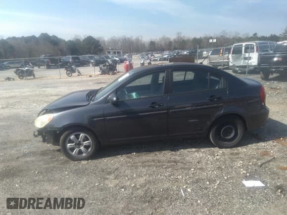 ✅ 2006 Hyundai Accent GLS • VIN: KMHCN46C66U027692 • Lot: 41796140. Listed on IAAI with 233,488 mi. Free auction sales archive from the USA and detailed vehicle history report at DreamBid. Image 14.