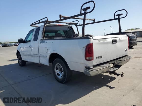 ✅ 1998 Ford F-150 XL • VIN: 1FTRX17L8WKA88804 • Lot: 53742675. Listed on Copart with 283,061 mi. Free auction sales archive from the USA and detailed vehicle history report at DreamBid. Image 2.