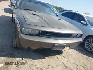 ✅ 2013 Dodge Challenger Rallye Redline • VIN: 2C3CDYAG7DH670128 • Lot: 41588960. Wystawiony na IAAI z przebiegiem 188 945 mil. Bezpłatny archiwum sprzedaży aukcyjnych z USA i szczegółowy raport historii pojazdu na DreamBid. Zdjęcie 6.