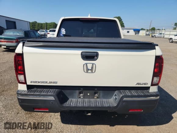 ✅ 2018 Honda Ridgeline RTL-E • VIN: 5FPYK3F70JB006099 • Lot: 71190585. Wystawiony na Copart z przebiegiem 49 234 mil. Bezpłatny archiwum sprzedaży aukcyjnych z USA i szczegółowy raport historii pojazdu na DreamBid. Zdjęcie 6.