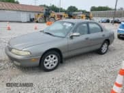 ✅ 1996 Mazda 626 • VIN: 1YVGE22D7T5534142 • Lot: 59589385. Listed on Copart with 118,467 mi. Free auction sales archive from the USA and detailed vehicle history report at DreamBid. Image 1.