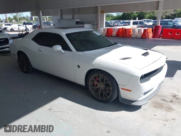 ✅ 2016 Dodge Challenger SRT Hellcat • VIN: 2C3CDZC99GH200224 • Lot: 43442618. Wystawiony na IAAI z przebiegiem 56 715 mil. Bezpłatny archiwum sprzedaży aukcyjnych z USA i szczegółowy raport historii pojazdu na DreamBid. Zdjęcie 1.