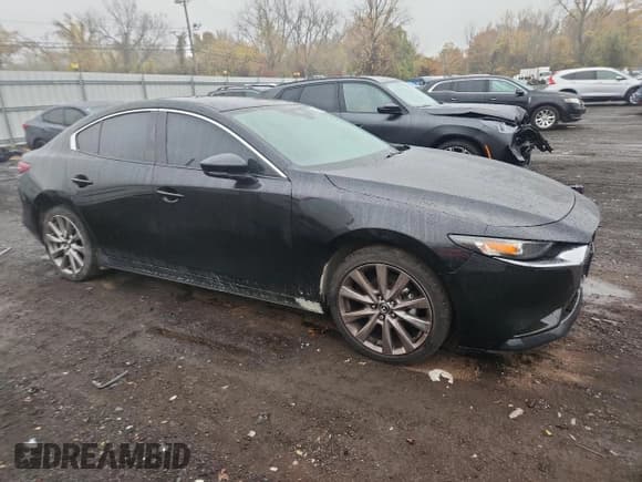 ✅ 2019 Mazda 3 Preferred • VIN: JM1BPACL6K1111729 • Lot: 82675575. Listed on Copart with 70,894 mi. Free auction sales archive from the USA and detailed vehicle history report at DreamBid. Image 4.