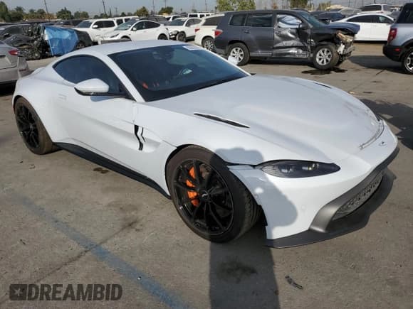 ✅ 2020 Aston Martin Vantage • VIN: SCFSMGAW1LGN03400 • Лот: 83032844. Опубликован ранее на Copart с пробегом 27 500 миль. Бесплатный доступ к архиву аукционных продаж из США и подробный отчёт об истории автомобиля на DreamBid. Изображение 4.